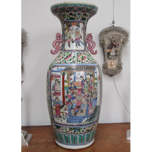 4065 - A 19th Century Canton vase, decorated with enamels, multiple areas of restoration to the body and ba... 