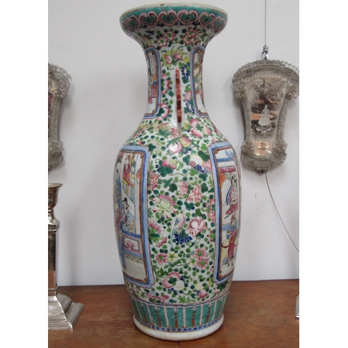 4065 - A 19th Century Canton vase, decorated with enamels, multiple areas of restoration to the body and ba... 