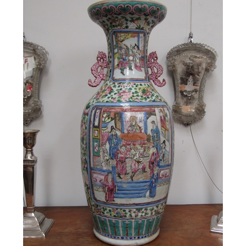 4065 - A 19th Century Canton vase, decorated with enamels, multiple areas of restoration to the body and ba... 