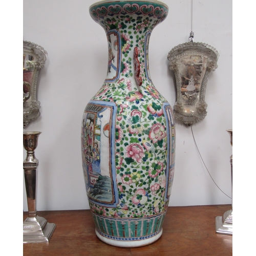 4065 - A 19th Century Canton vase, decorated with enamels, multiple areas of restoration to the body and ba... 