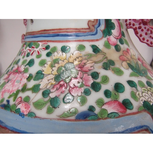 4065 - A 19th Century Canton vase, decorated with enamels, multiple areas of restoration to the body and ba... 