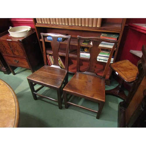 4072 - A near pair of early 19th Century East Anglian elm chairs with flat seats over chamfered square legs... 