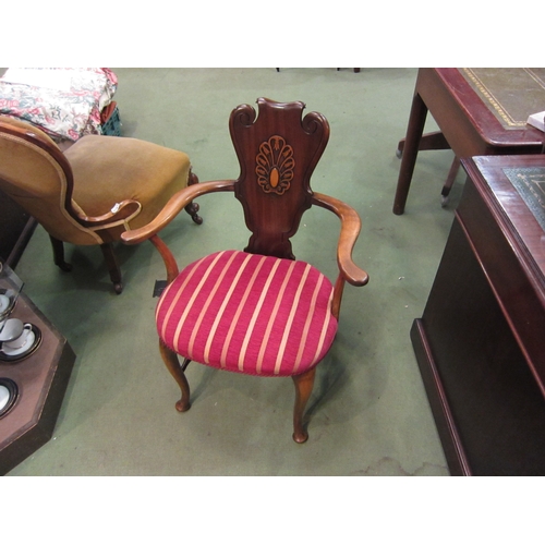 4073 - A Regency style mahogany armchair with shaped back rest having blind fret moulded decoration, the ou... 