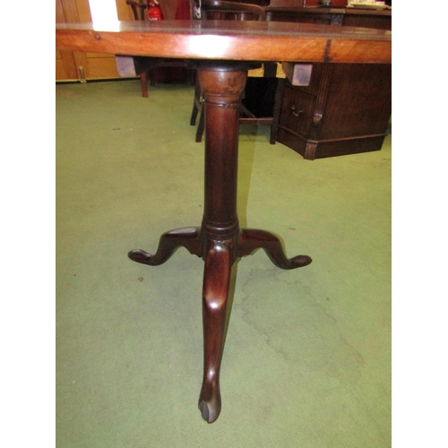 4087 - A George III circular tilt-top wine table on a cannon barrel turned column and tripod base, 69cm tal... 