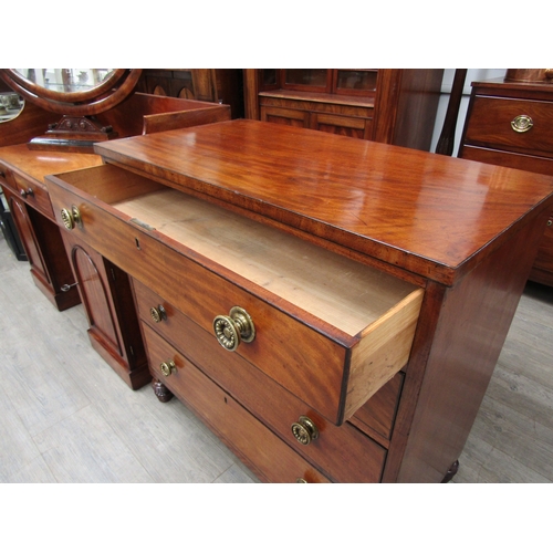 4092 - A Circa 1830 flame mahogany chest of four graduating long drawers with ebony lined inlay, the decora... 