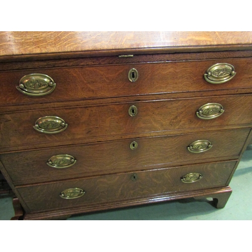 4109 - A circa 1780 North Country George III English oak with crossbanded mahogany bureau, the fall with ke... 