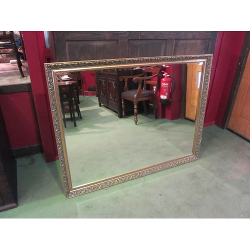 4144 - A large gilt rectangular bevel edge wall mirror, 103cm x 134cm total     (R) £20