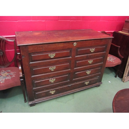 4147 - An 18th Century oak and elm country house mule chest with lift-top, faux drawer front with three low... 