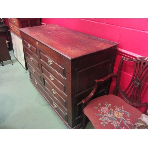 4147 - An 18th Century oak and elm country house mule chest with lift-top, faux drawer front with three low... 