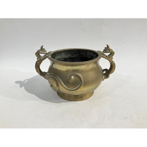 4280 - A Chinese bronze incense bowl with Lizard/Dragon handles, six mark character to base, 24cm diameter ... 