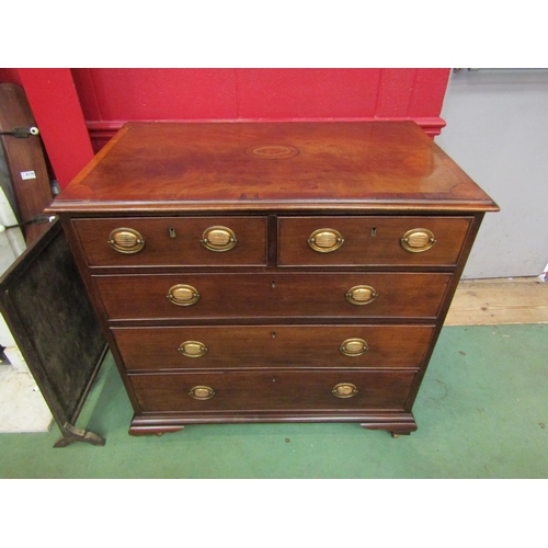 4174 - A Georgian crossbanded and inlaid flame mahogany chest of two short over three graduating long drawe... 