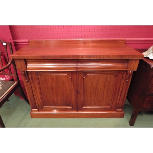 4222 - A Circa 1860 mahogany chiffonier, the raised back over carved corbels and two cushion frieze drawers... 