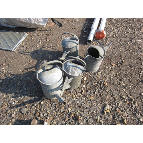 3360 - Four galvanised watering cans