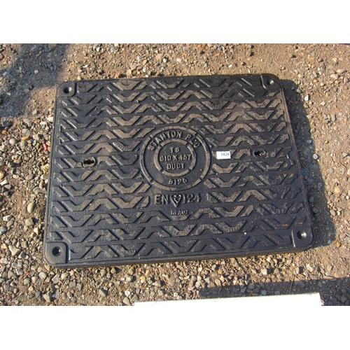 3426 - An iron drain cover in frame