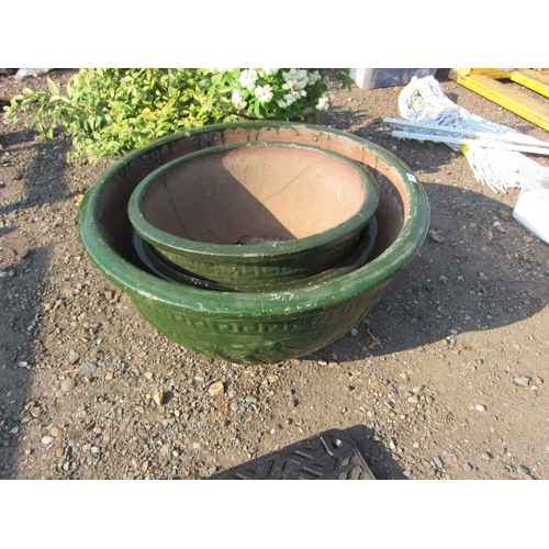 3427 - Three green glazed pots