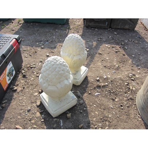 3454 - A pair of pineapple finials