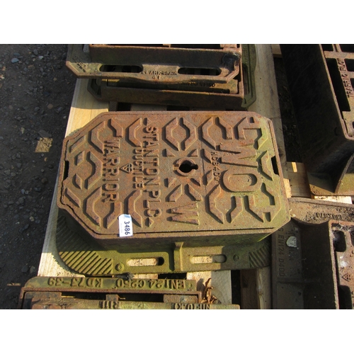 3486 - A cast drain cover with frame   (R)  £10