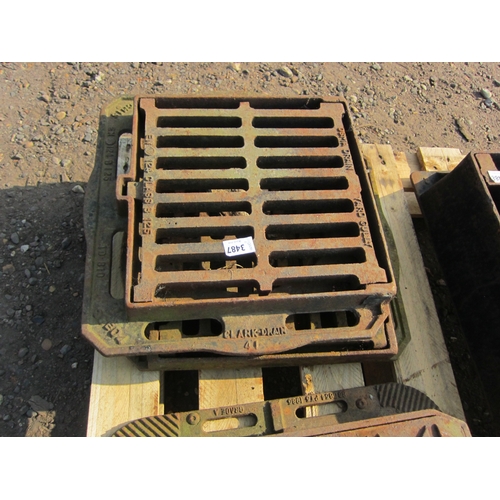 3487 - Two cast drain covers with frames