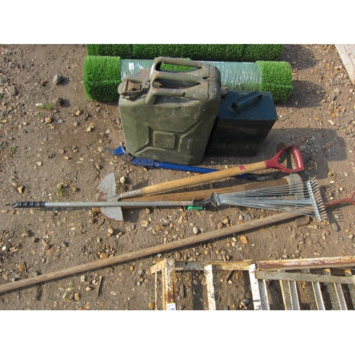 3495 - A jerry can and a quantity of mixed tools including a pickaxe, etc