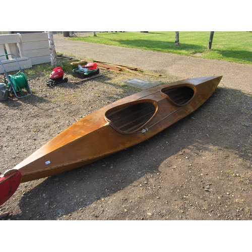 3508 - A vintage wooden canoe