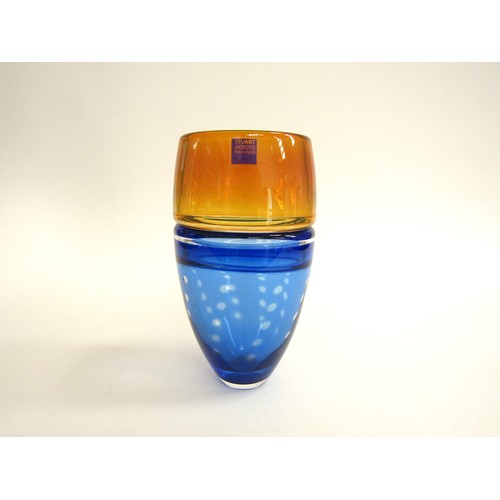 7154 - A Stuart Akroyd fish eye vase in blue and amber.  Signed to base. 19cm high