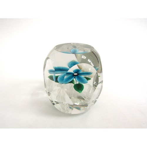 7170 - A Strathearn 1973 paperweight with blue flower, cut sides. Date Cane. 18.5cm high