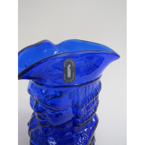 7201 - A Whitefriars glass Toby jug in blue colourway, labelled. 17cm high