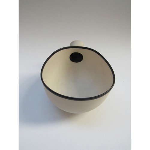 7085 - NICHOLAS HOMOKY (b.1950) An early white porcelain spouted handle bowl with black rim and spout inter... 