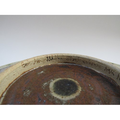 7073 - ERIC JAMES MELLON (1925 - 2014): An early studio pottery plate with ash glaze dot and line detail, s... 