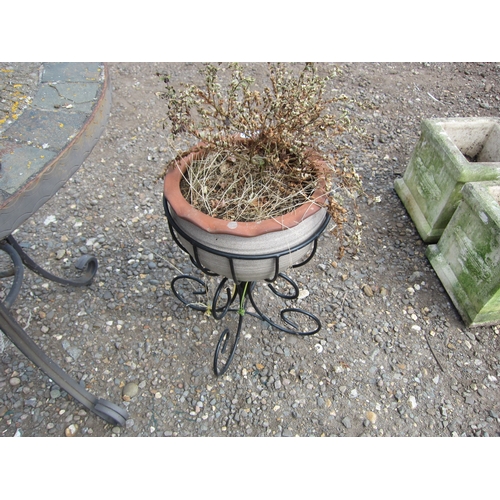 3552 - A glazed terracotta pot in a metal pot stand   (R)