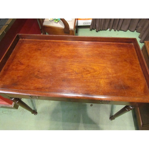 4001 - A circa 1850 mahogany side table, the three quarter raised top over two single frieze drawers on tur... 