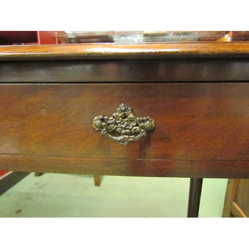 4001 - A circa 1850 mahogany side table, the three quarter raised top over two single frieze drawers on tur... 