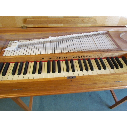 4024 - A 1970's clavichord, cased in oak, by Brian Joseph Summers, an aircraft engineer, built in 1974, wit... 