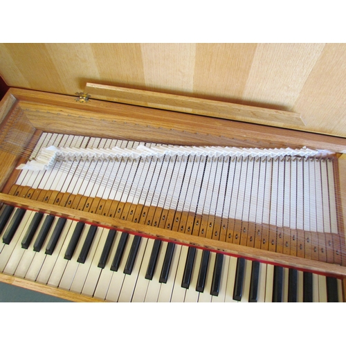 4024 - A 1970's clavichord, cased in oak, by Brian Joseph Summers, an aircraft engineer, built in 1974, wit... 