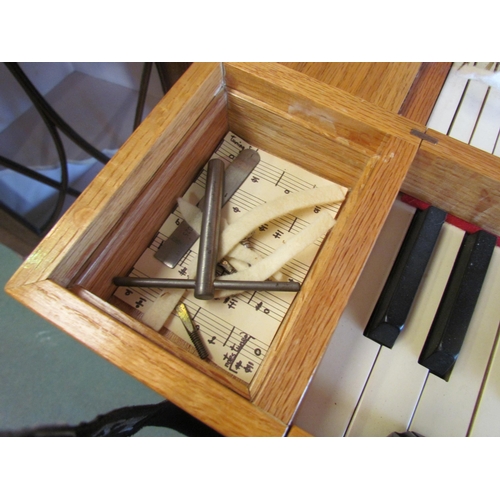 4024 - A 1970's clavichord, cased in oak, by Brian Joseph Summers, an aircraft engineer, built in 1974, wit... 