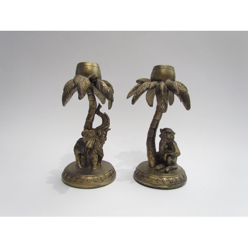 4069 - A pair of figural candlesticks of palm trees with elephant and monkey, approximately 19cm tall