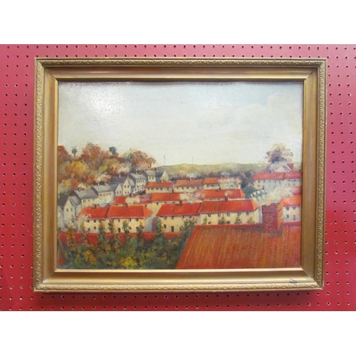 4107 - A 20th Century unsigned oil on board of rooftops, 34cm x 44cm image size