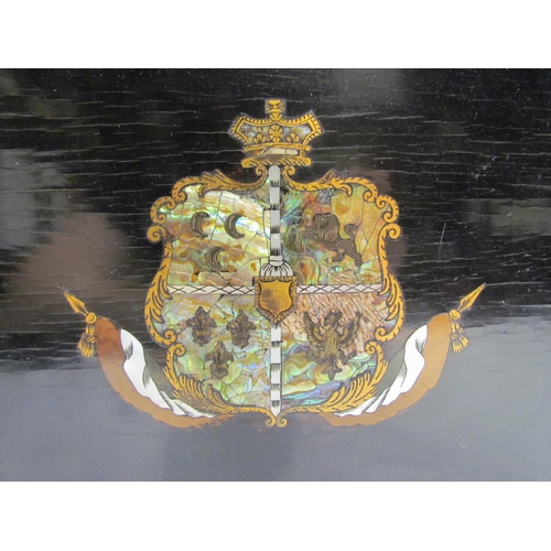 4108 - An ebonised mother-of-pearl and abalone inlay coat of arms design sewing box