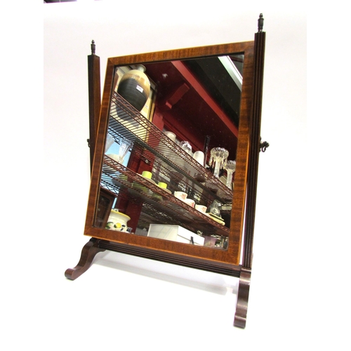 4110 - An Edwardian mahogany dressing chest tilting mirror with brass finials on reeded supports and scroll... 