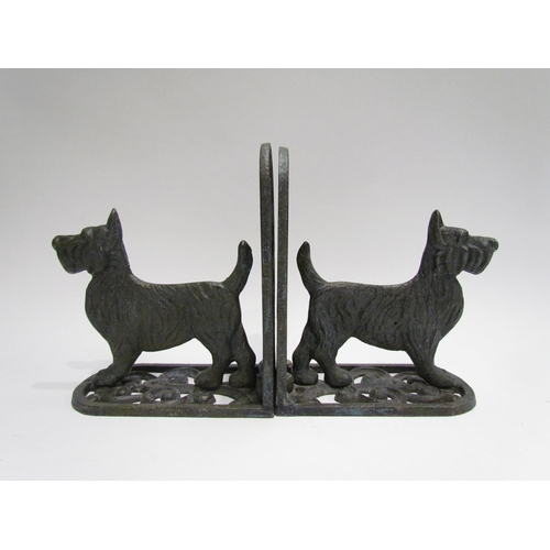 4111 - A pair of metal book-ends of Scottie dogs, 16cm tall