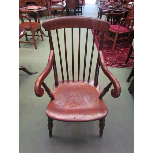 4117 - A circa 1860 Thames Valley elm and ash stick-back Windsor armchair, the scroll arms and saddle seat ... 