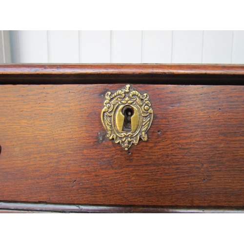 4125 - An 18th Century oak side table, the two plank top with pinched corners over a single drawer and shap... 