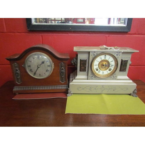 4157 - Two mantel clocks, one architectural form with lion mask detail