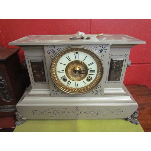 4157 - Two mantel clocks, one architectural form with lion mask detail