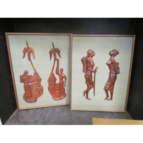 4165 - Two Singaporean mid-20th Century carved hardwood figural scene pictures, framed, 66cm x 50cm total  ... 