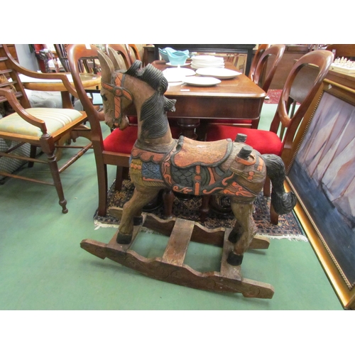 4188 - A carved and painted wooden rocking horse on treadle base (not attached)