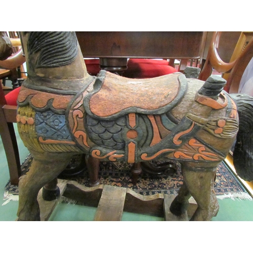 4188 - A carved and painted wooden rocking horse on treadle base (not attached)