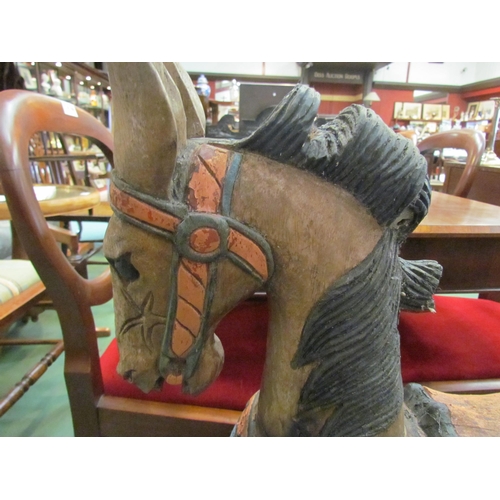 4188 - A carved and painted wooden rocking horse on treadle base (not attached)