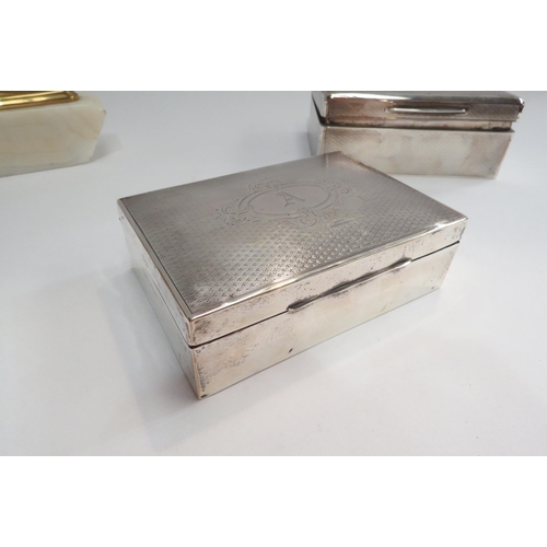 4335 - Four silver boxes and cigarette cases together with a Ronson agate table lighter