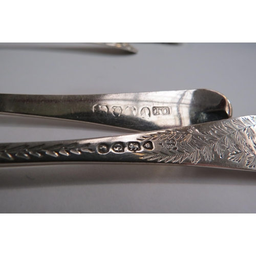 4336 - A Victorian ornate silver Christening spoon and fork (maker's mark RM/EH).  London 1884 and Sheffiel... 